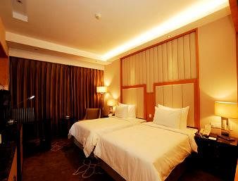 Imagen de la habitación del Hotel Ramada Plaza by Wyndham Yangzhou Casa. Foto 4