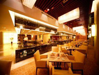 Imagen del bar/restaurante del Hotel Ramada Plaza by Wyndham Yangzhou Casa. Foto 2