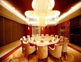 Imagen del bar/restaurante del Hotel Ramada Plaza by Wyndham Yangzhou Casa. Foto 3