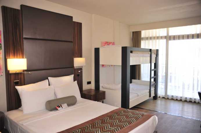 Imagen de la habitación del Hotel Ramada Resort By Wyndham Akbuk. Foto 11