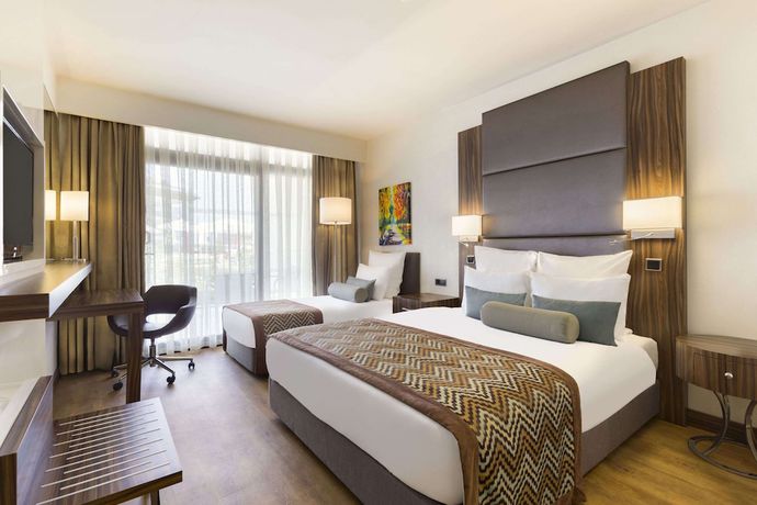 Imagen de la habitación del Hotel Ramada Resort By Wyndham Akbuk. Foto 12