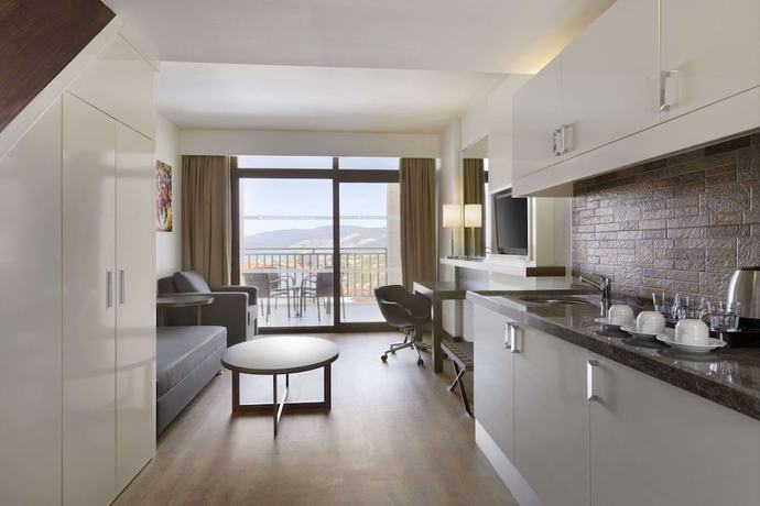 Imagen de la habitación del Hotel Ramada Resort By Wyndham Akbuk. Foto 13