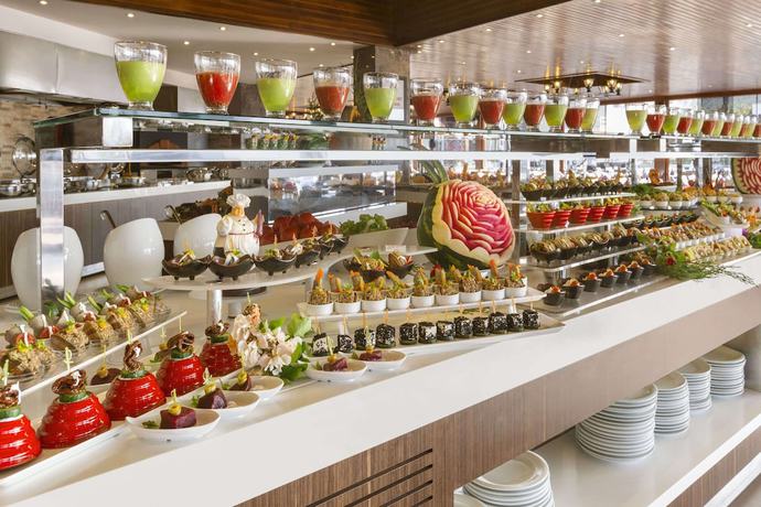 Imagen del bar/restaurante del Hotel Ramada Resort By Wyndham Akbuk. Foto 5