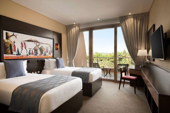 Imagen de la habitación del Hotel Ramada Resort By Wyndham Dar Es Salaam. Foto 15