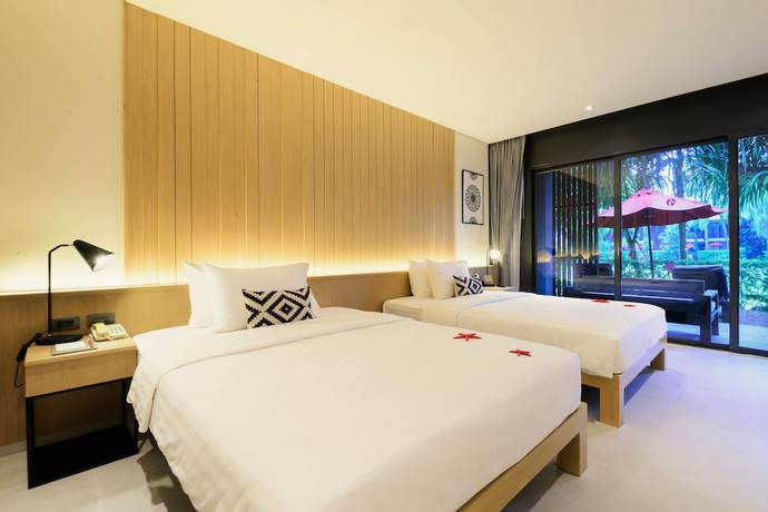Imagen de la habitación del Hotel Ramada Resort By Wyndham Khao Lak. Foto 11