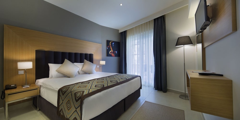 Imagen de la habitación del Hotel Ramada Resort By Wyndham Kusadasi. Foto 13