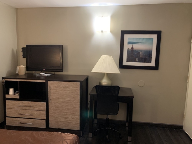 Imagen de la habitación del Hotel Ramada Rockville Centre. Foto 15