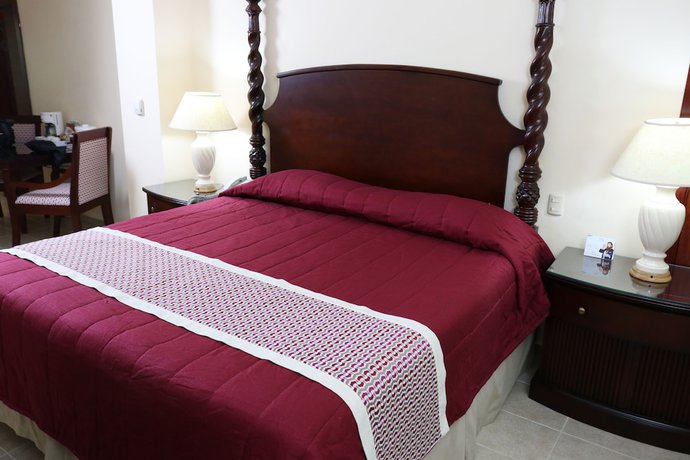 Imagen de la habitación del Hotel Ramada Santo Domingo Princess. Foto 12