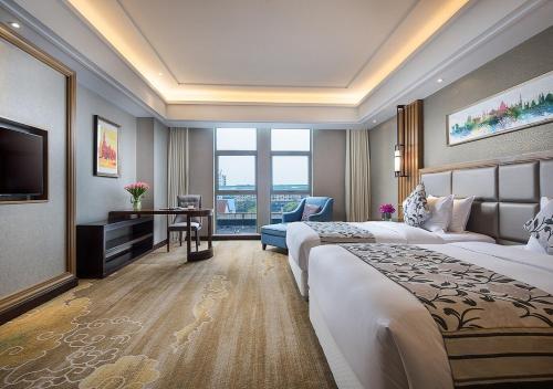 Imagen de la habitación del Hotel Ramada Shanghai East. Foto 4
