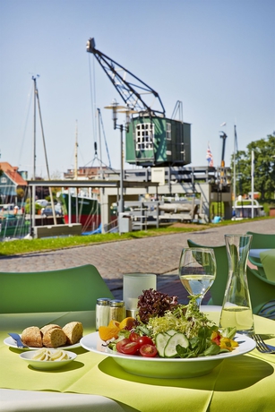 Imagen del bar/restaurante del Hotel Ramada Stade. Foto 4