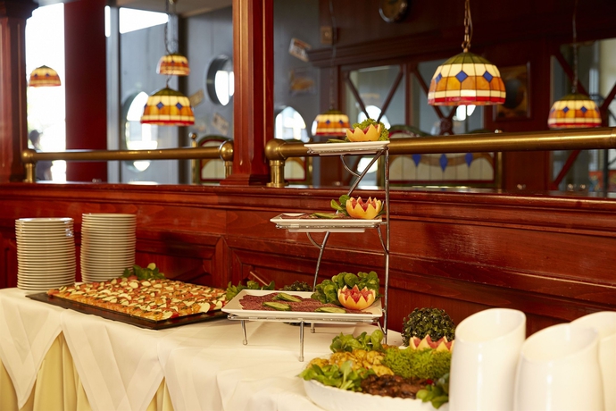 Imagen del bar/restaurante del Hotel Ramada Stade. Foto 6