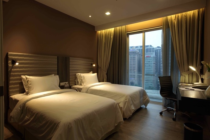 Imagen de la habitación del Hotel Ramada Suites By Wyndham Kuala Lumpur City Centre. Foto 8