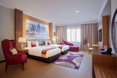 Imagen de la habitación del Hotel Ramada Suites By Wyndham Solo. Foto 8