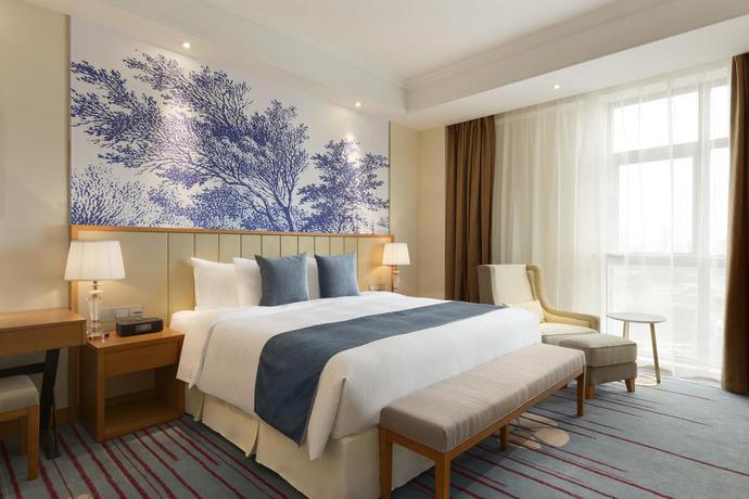 Imagen de la habitación del Hotel Ramada Suzhou. Foto 4