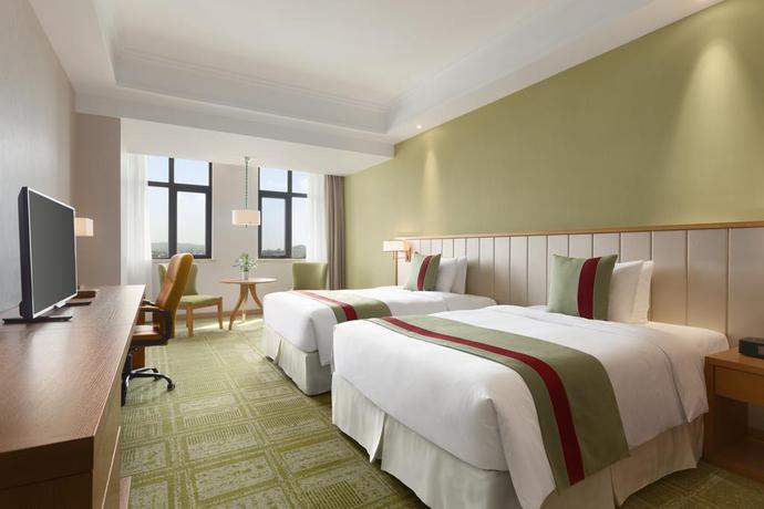Imagen de la habitación del Hotel Ramada Suzhou. Foto 9