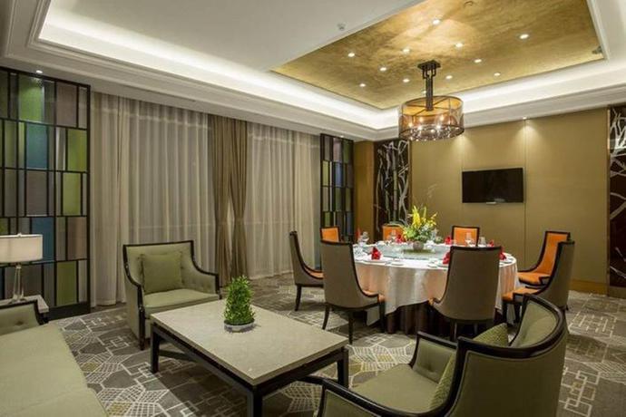 Imagen del bar/restaurante del Hotel Ramada Suzhou. Foto 2