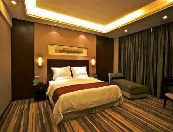 Imagen de la habitación del Hotel Ramada Suzhou Luzhi. Foto 1