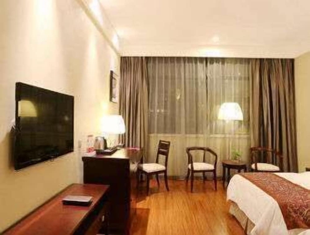 Imagen de la habitación del Hotel Ramada Suzhou Luzhi. Foto 2