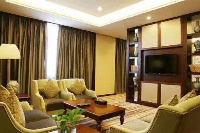 Imagen de la habitación del Hotel Ramada Suzhou Luzhi. Foto 4