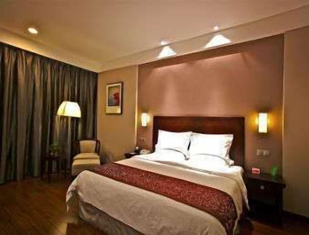 Imagen de la habitación del Hotel Ramada Suzhou Luzhi. Foto 6