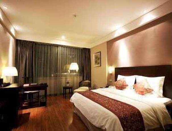 Imagen de la habitación del Hotel Ramada Suzhou Luzhi. Foto 7