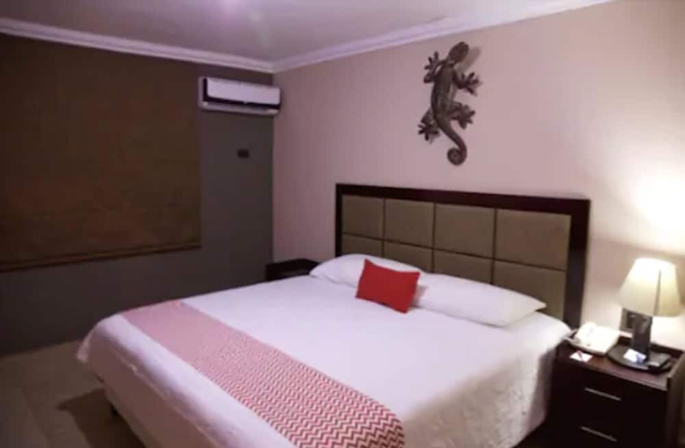 Imagen de la habitación del Hotel Ramada Tikal Isla De Flores. Foto 12