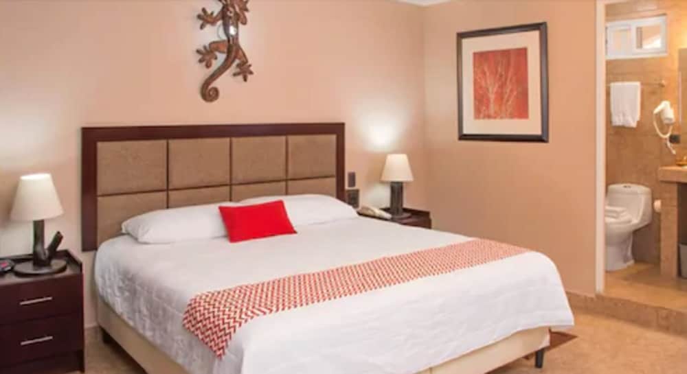 Imagen de la habitación del Hotel Ramada Tikal Isla De Flores. Foto 13