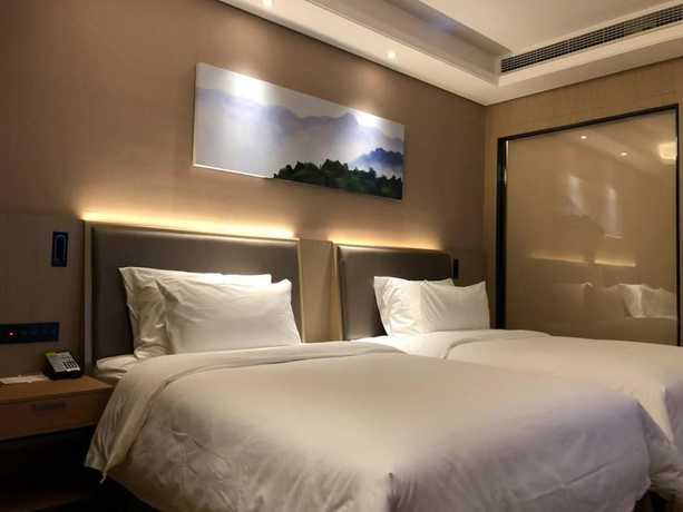 Imagen de la habitación del Hotel Ramada Wyndham Zhengzhou Xinzheng. Foto 2