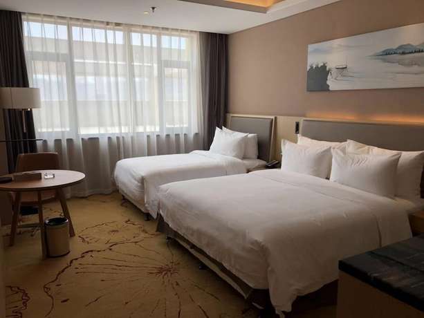 Imagen de la habitación del Hotel Ramada Wyndham Zhengzhou Xinzheng. Foto 3