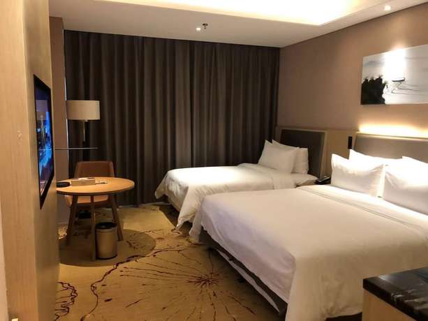 Imagen de la habitación del Hotel Ramada Wyndham Zhengzhou Xinzheng. Foto 4