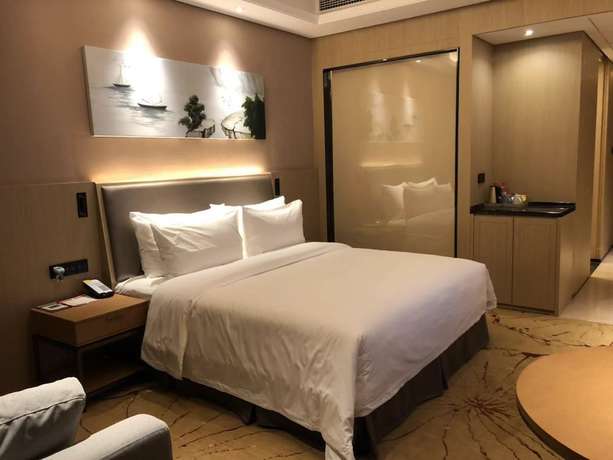 Imagen de la habitación del Hotel Ramada Wyndham Zhengzhou Xinzheng. Foto 6
