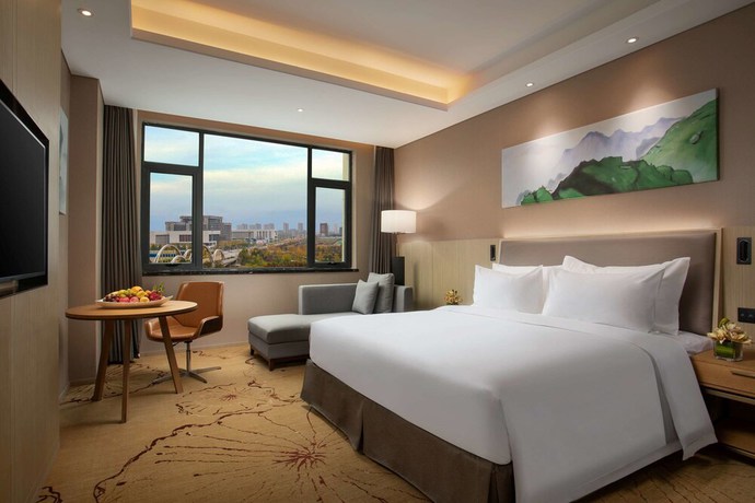 Imagen de la habitación del Hotel Ramada Wyndham Zhengzhou Xinzheng. Foto 7