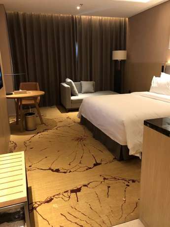 Imagen de la habitación del Hotel Ramada Wyndham Zhengzhou Xinzheng. Foto 9