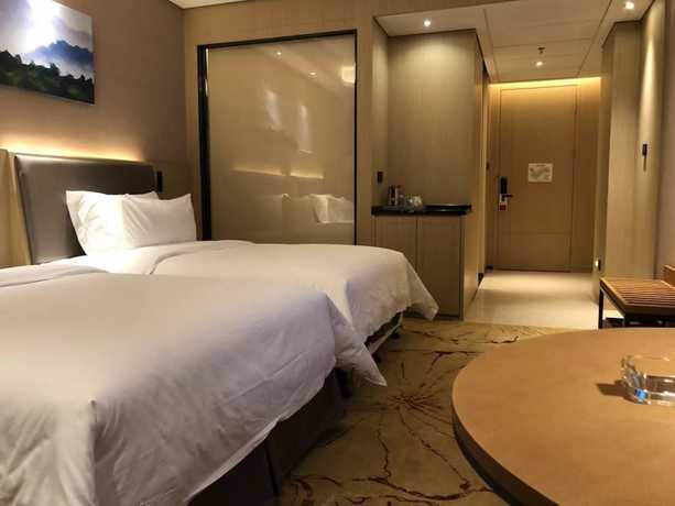 Imagen de la habitación del Hotel Ramada Wyndham Zhengzhou Xinzheng. Foto 11