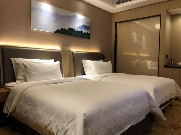 Imagen de la habitación del Hotel Ramada Wyndham Zhengzhou Xinzheng. Foto 12
