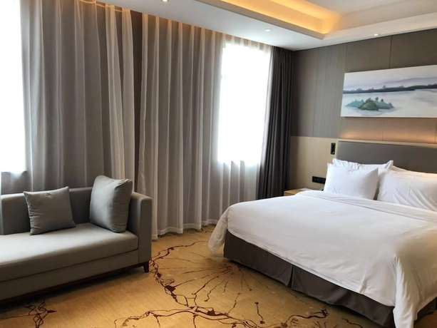 Imagen de la habitación del Hotel Ramada Wyndham Zhengzhou Xinzheng. Foto 14