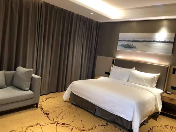 Imagen de la habitación del Hotel Ramada Wyndham Zhengzhou Xinzheng. Foto 15