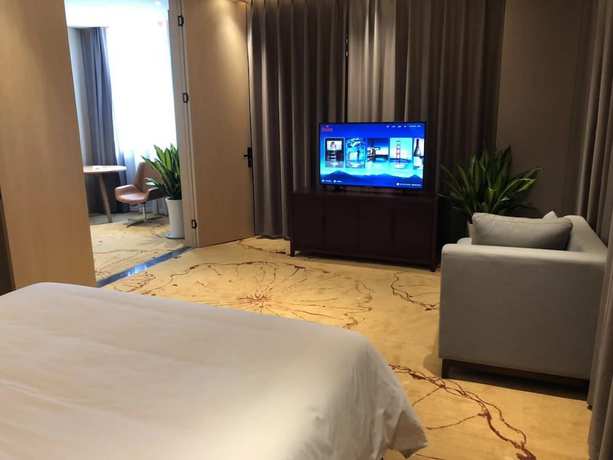 Imagen de la habitación del Hotel Ramada Wyndham Zhengzhou Xinzheng. Foto 17