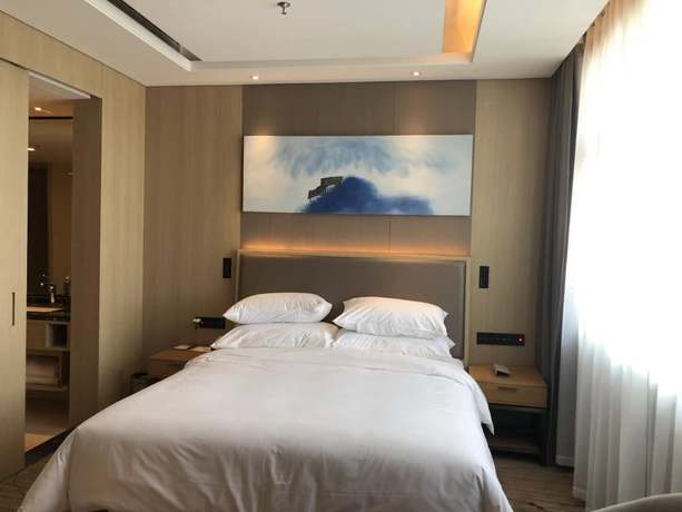 Imagen de la habitación del Hotel Ramada Wyndham Zhengzhou Xinzheng. Foto 18