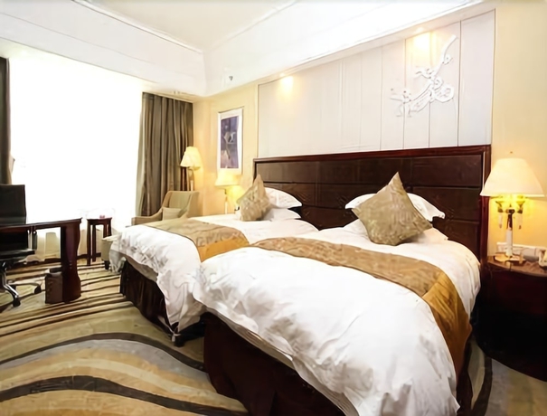 Imagen de la habitación del Hotel Ramada Yangzhou Baoying. Foto 5