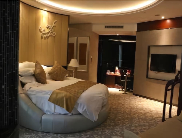 Imagen de la habitación del Hotel Ramada Yangzhou Baoying. Foto 7
