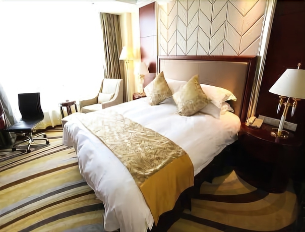 Imagen de la habitación del Hotel Ramada Yangzhou Baoying. Foto 9