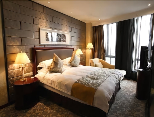 Imagen de la habitación del Hotel Ramada Yangzhou Baoying. Foto 11