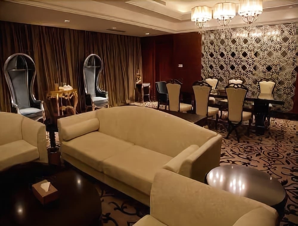 Imagen de la habitación del Hotel Ramada Yangzhou Baoying. Foto 12