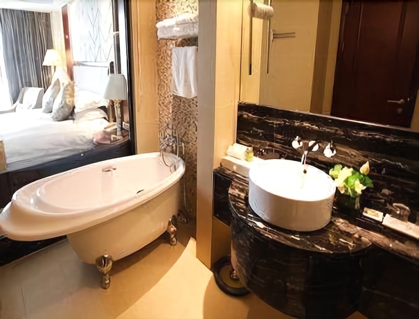 Imagen de la habitación del Hotel Ramada Yangzhou Baoying. Foto 13