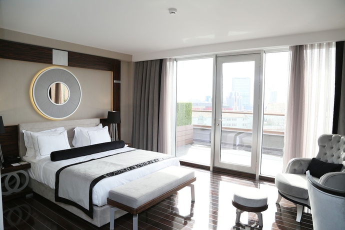 Imagen de la habitación del Hotel Ramada and Suites By Wyndham Istanbul Sisli. Foto 6