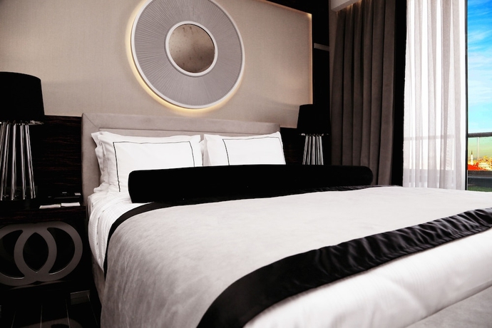 Imagen de la habitación del Hotel Ramada and Suites By Wyndham Istanbul Sisli. Foto 13