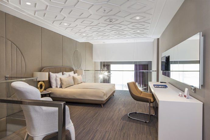 Imagen de la habitación del Hotel Ramada and Suites By Wyndham Izmir Kemalpasa. Foto 14