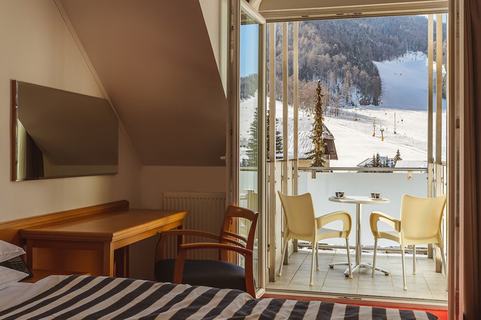 Imagen de la habitación del Hotel Ramada and Suites by Wyndham Kranjska Gora. Foto 6