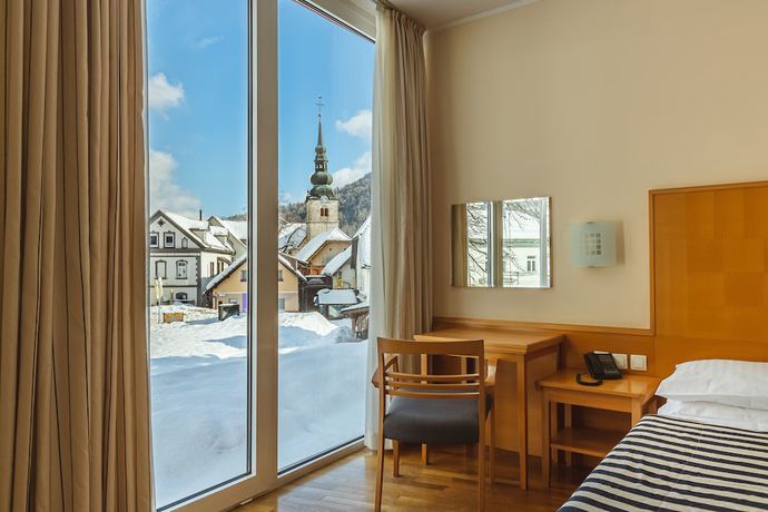 Imagen de la habitación del Hotel Ramada and Suites by Wyndham Kranjska Gora. Foto 10